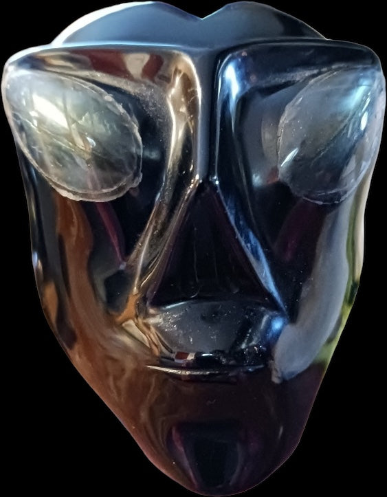 Black obsidian alien skull carving